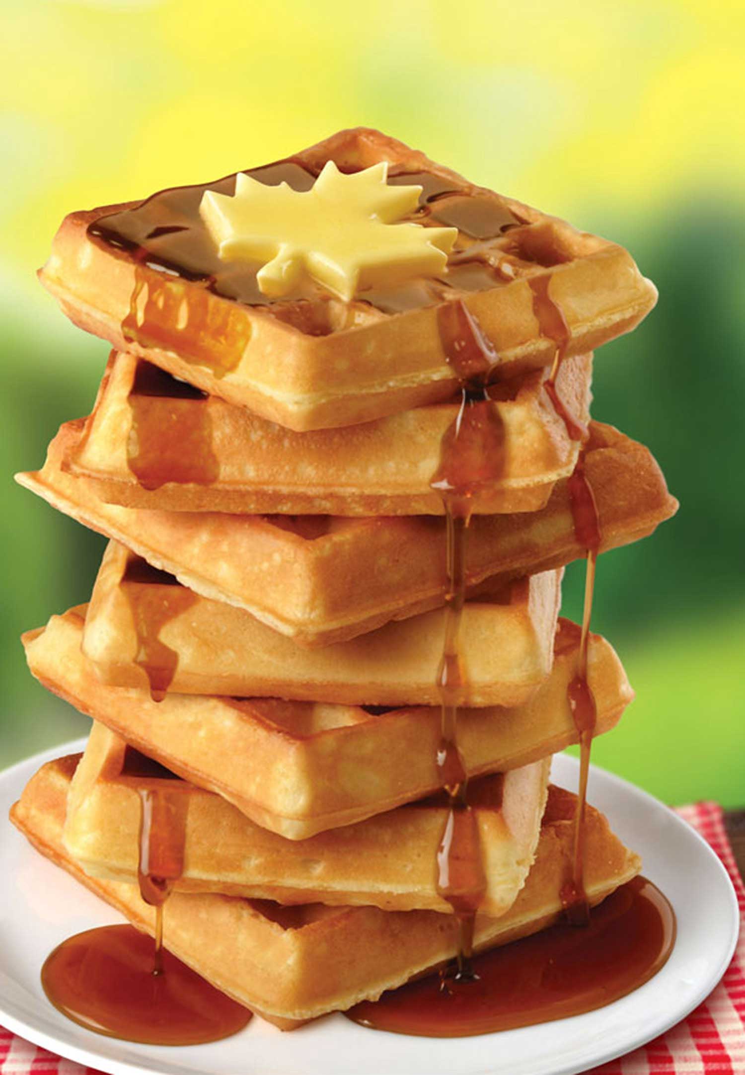 mike wepplo photoreal photography waffle stack with maple syrup drizzle