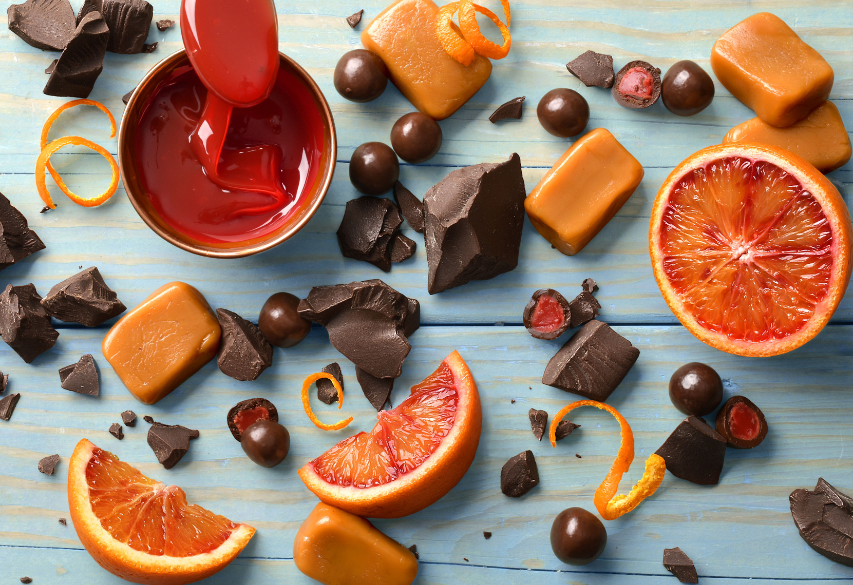 mike wepplo photoreal photography orange slices with caramel and chocolates