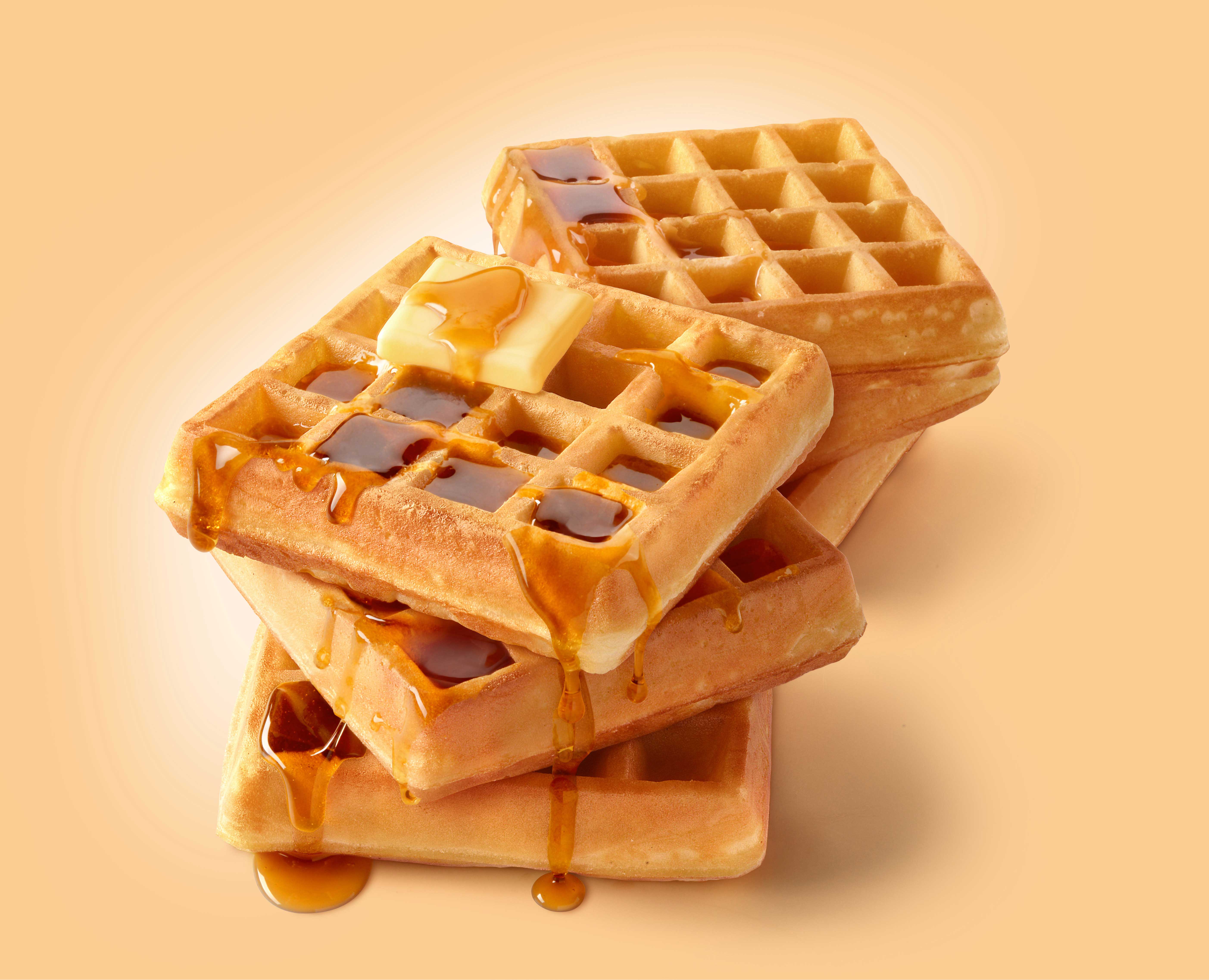 mike wepplo photoreal photography waffle stack with syrup and butter