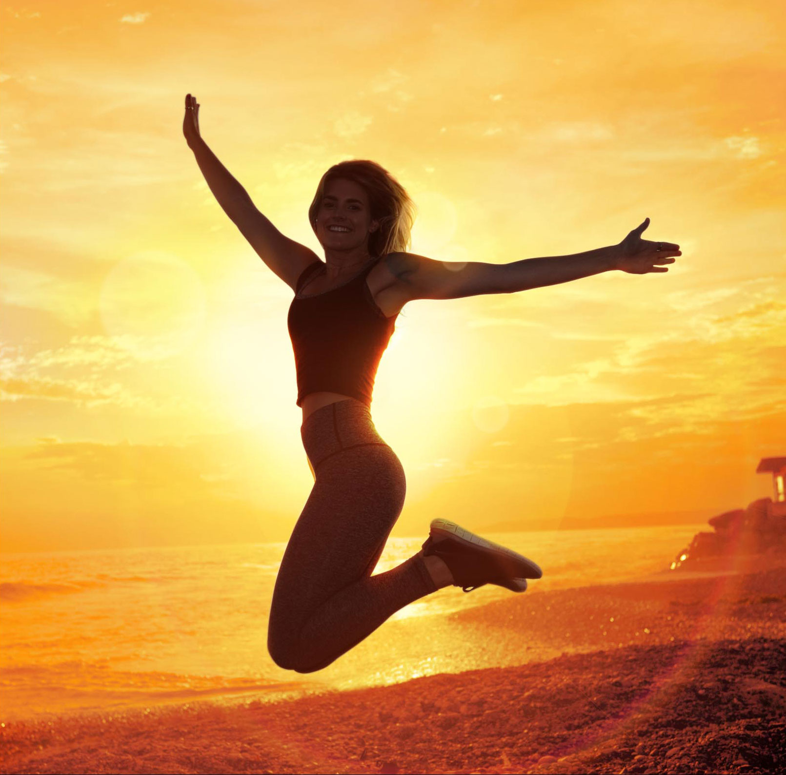 mike wepplo lifestyle photography vitamin bottle women jumping at sunset